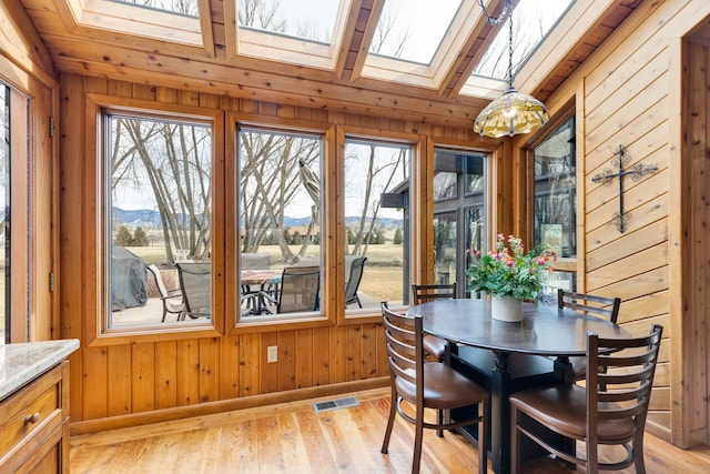 297 Christofferson Ln, Corvallis, MT 59828 - sunroom / solarium with a skylight, a mountain view, and lofted ceiling