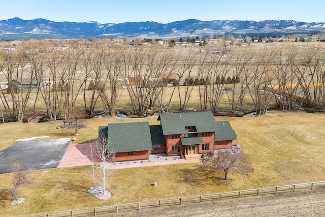 birds eye view of property featuring a rural view and a mountain view