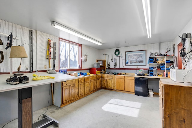 297 Christofferson Ln, Corvallis, MT 59828 - kitchen featuring refrigerator, wallpapered walls, brown cabinets, and light countertops