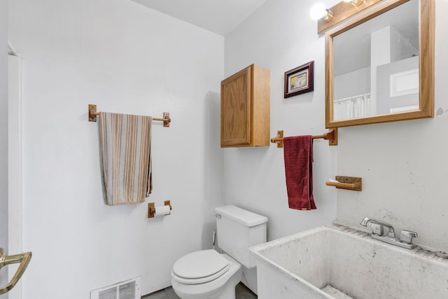 297 Christofferson Ln, Corvallis, MT 59828 - full bathroom featuring a sink and toilet