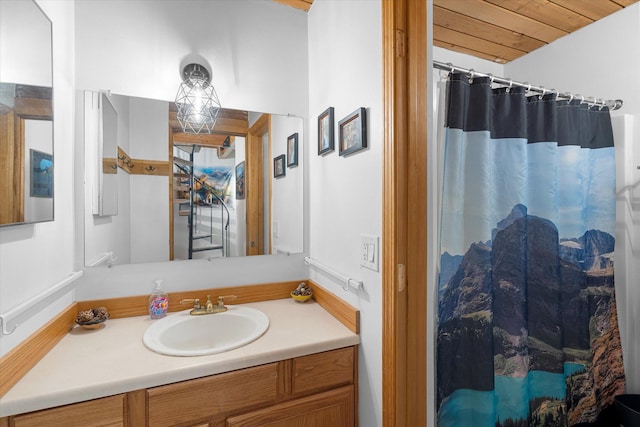 full bathroom with a shower with shower curtain, wooden ceiling, and vanity