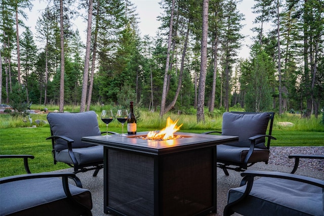 view of patio featuring a fire pit