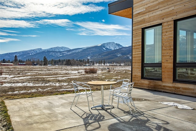 view of patio with a mountain view