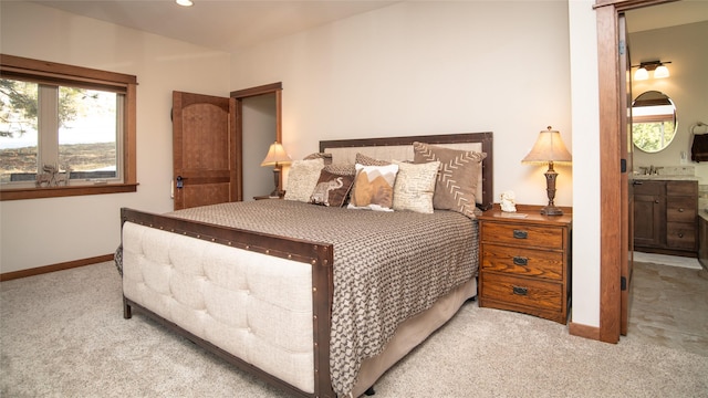 bedroom featuring carpet and baseboards