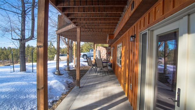 view of snow covered patio