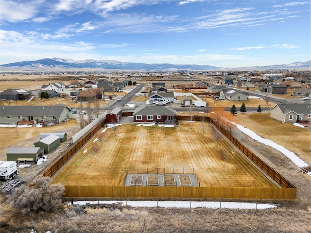 drone / aerial view featuring a mountain view and a residential view