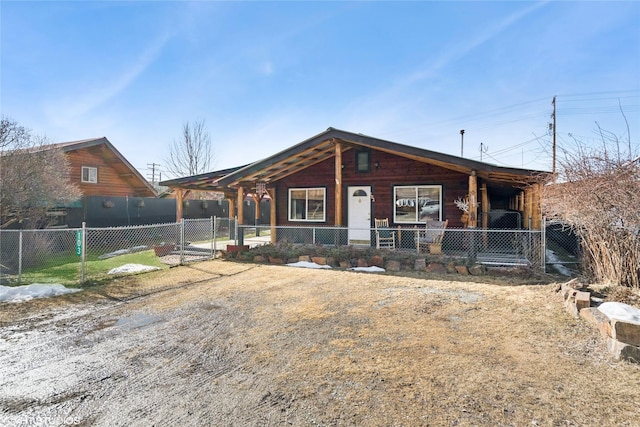 view of front of home featuring a gate and fence