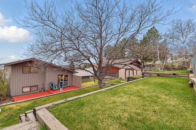325 28th Ave NW, Great Falls, MT 59404 - view of yard with an outdoor structure, fence, and a storage unit