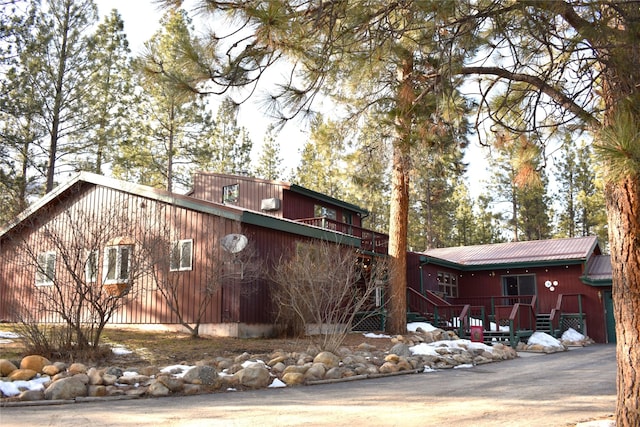 exterior space featuring metal roof