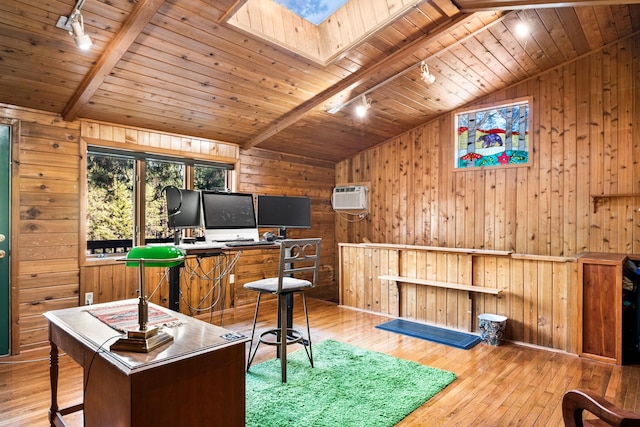 437 Tie Chute Ln, Florence, MT 59833 - game room with rail lighting, wood walls, light wood-style floors, wooden ceiling, and a skylight