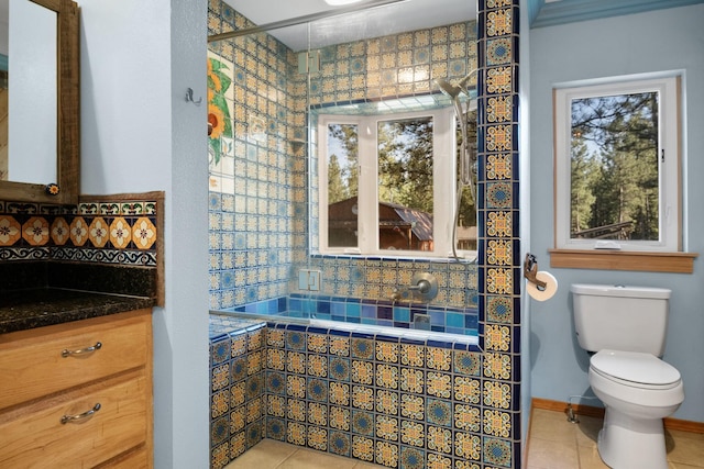 437 Tie Chute Ln, Florence, MT 59833 - bathroom featuring tile patterned flooring, toilet, backsplash, and vanity