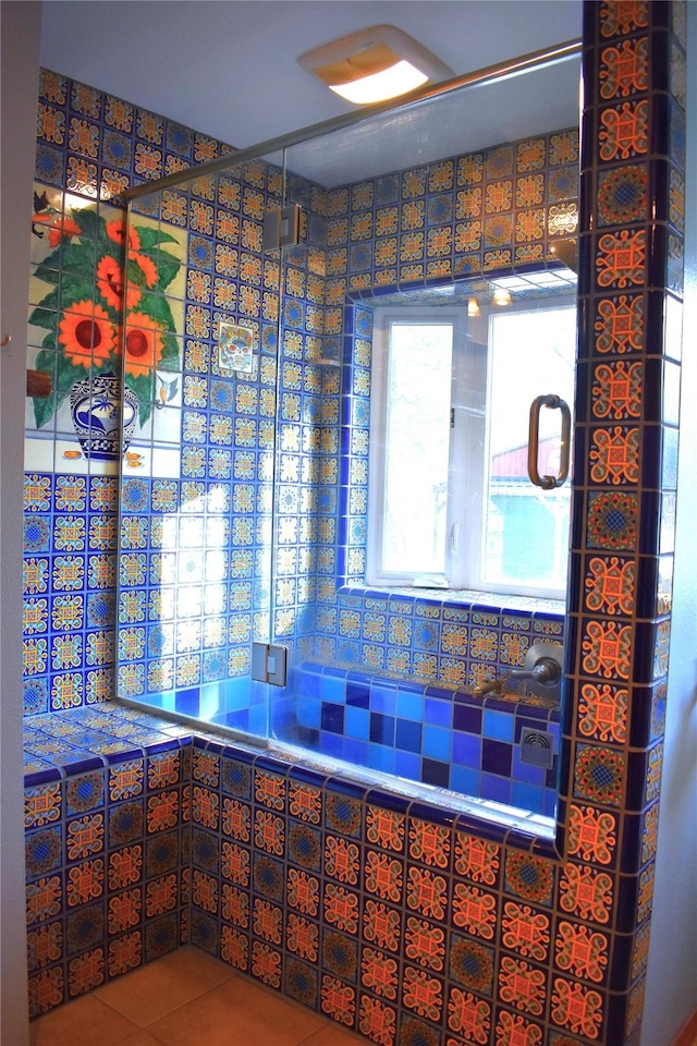437 Tie Chute Ln, Florence, MT 59833 - bathroom with tile patterned flooring and tiled shower