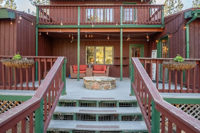 437 Tie Chute Ln, Florence, MT 59833 - wooden terrace with an outdoor hangout area
