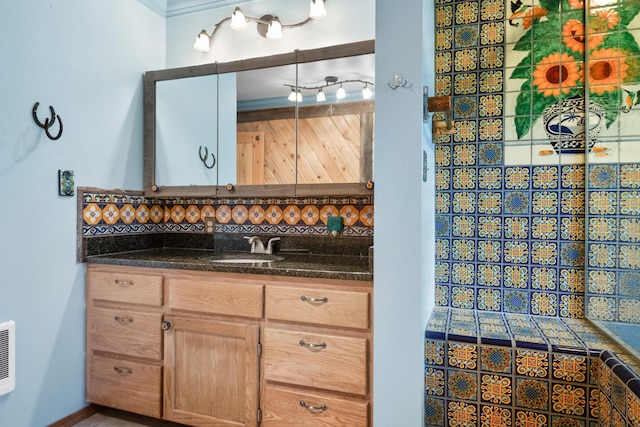 437 Tie Chute Ln, Florence, MT 59833 - bathroom with decorative backsplash and vanity