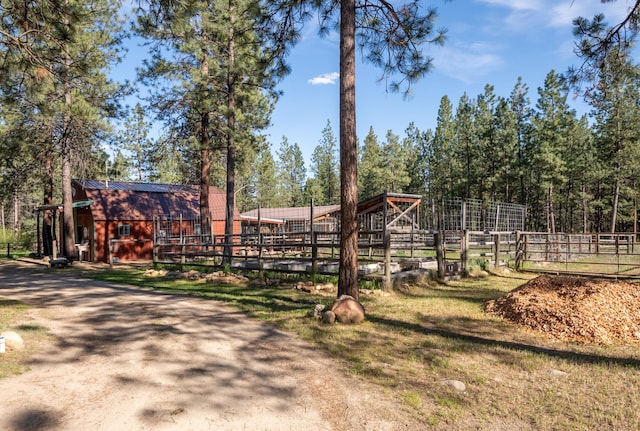 437 Tie Chute Ln, Florence, MT 59833 - view of yard with an outdoor structure and fence