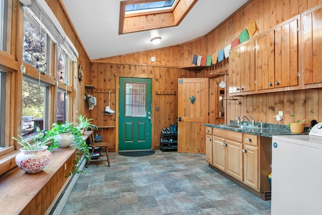 437 Tie Chute Ln, Florence, MT 59833 - clothes washing area with washer / dryer, wood walls, and a skylight