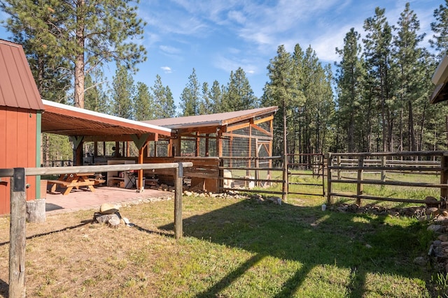 437 Tie Chute Ln, Florence, MT 59833 - view of yard featuring an exterior structure and an outbuilding