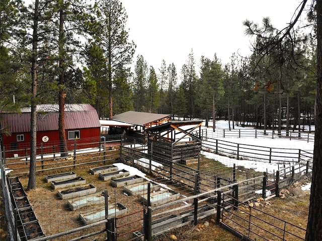 view of home's community with an outdoor structure and an exterior structure