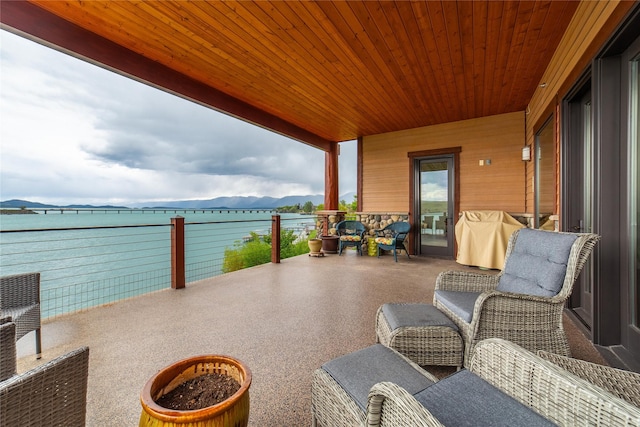 602 6th St W Unit 104, Polson, MT 59860 - view of patio / terrace featuring a mountain view