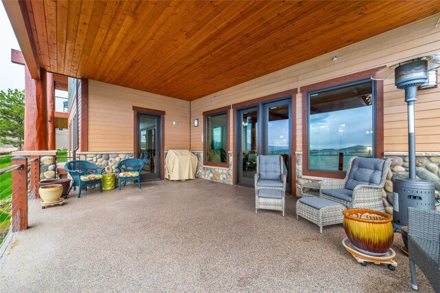 602 6th St W Unit 104, Polson, MT 59860 - view of patio / terrace featuring a grill