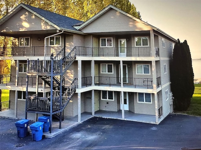 50550 US Highway 93 Unit 6, Polson, MT 59860 - view of building exterior with driveway and stairway