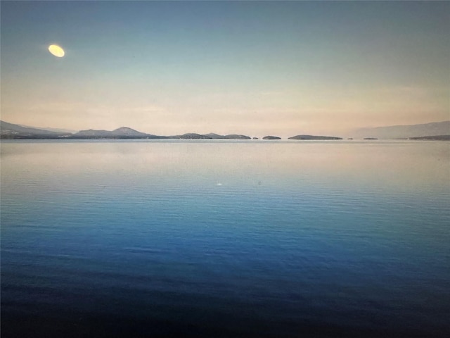 property view of water featuring a mountain view