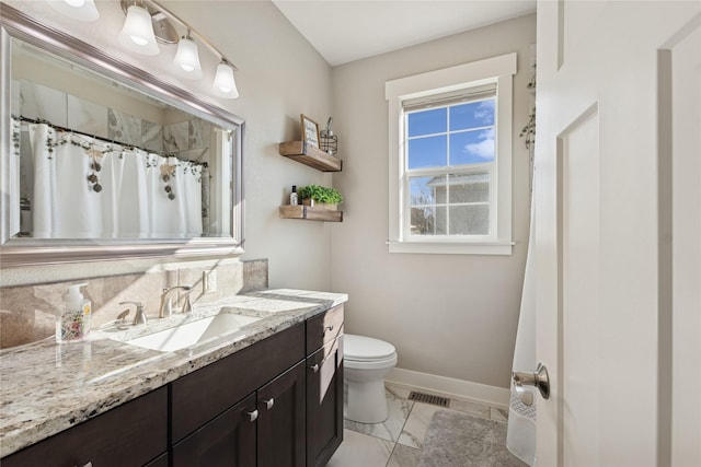 101 Shellan Way, Kalispell, MT 59901 - full bath with vanity, marble finish floors, and a shower with curtain