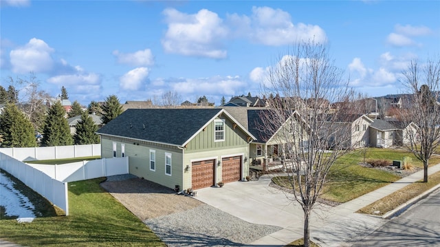 101 Shellan Way, Kalispell, MT 59901 - craftsman inspired home featuring board and batten siding, driveway, a garage, a residential view, and a shingled roof