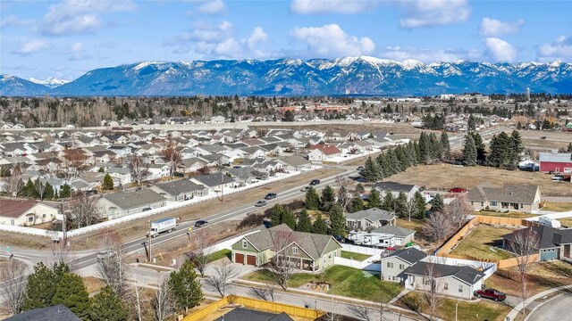 101 Shellan Way, Kalispell, MT 59901 - aerial perspective of suburban area featuring a mountain backdrop