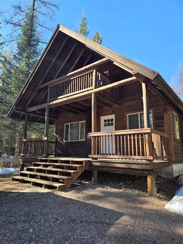 view of front facade with a porch and metal roof