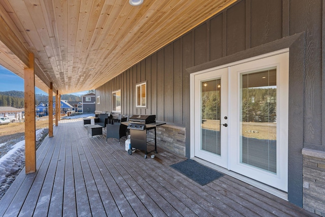 wooden deck featuring french doors and grilling area