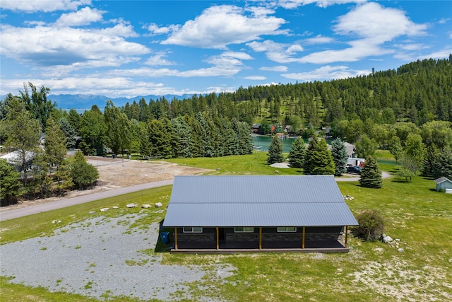 aerial view featuring a forest view