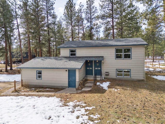 split foyer home with fence