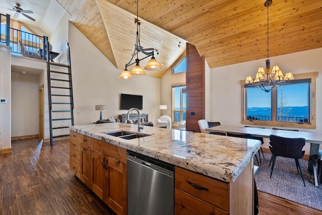 476 Elk Highlands Dr, Whitefish, MT 59937 - kitchen with stainless steel dishwasher, high vaulted ceiling, a sink, a chandelier, and open floor plan