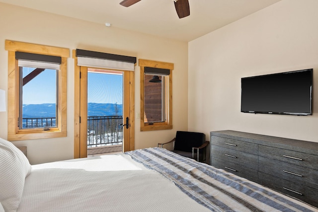 bedroom featuring a ceiling fan and access to exterior