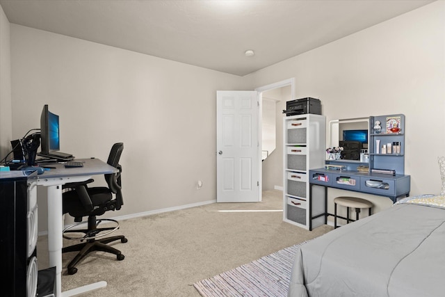 carpeted bedroom with baseboards