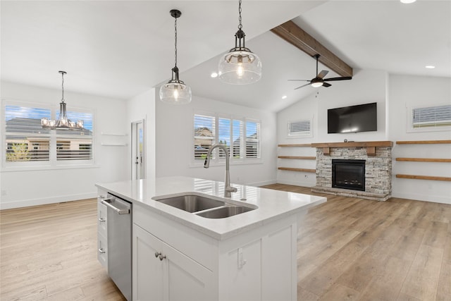 154 W Swift Creek Way, Kalispell, MT 59901 - kitchen featuring plenty of natural light, light wood-style floors, open floor plan, stainless steel dishwasher, and recessed lighting