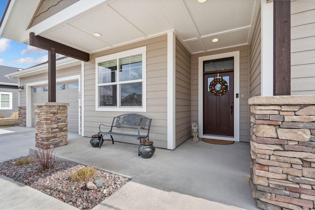 doorway to property featuring stone siding