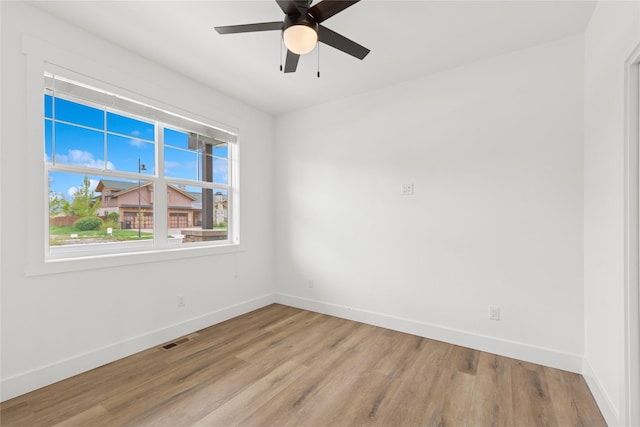 154 W Swift Creek Way, Kalispell, MT 59901 - spare room featuring light wood finished floors and a ceiling fan