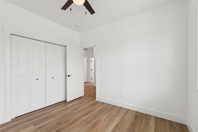 154 W Swift Creek Way, Kalispell, MT 59901 - unfurnished bedroom featuring light wood finished floors, a closet, and ceiling fan