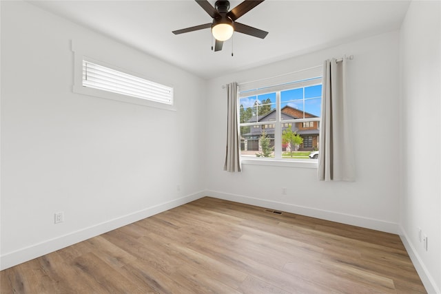 154 W Swift Creek Way, Kalispell, MT 59901 - unfurnished room with a ceiling fan, light wood-type flooring, and baseboards