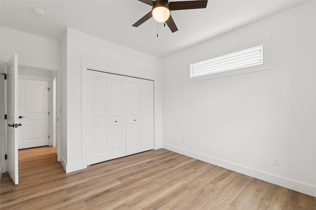 154 W Swift Creek Way, Kalispell, MT 59901 - unfurnished bedroom with light wood-style flooring, a closet, and ceiling fan