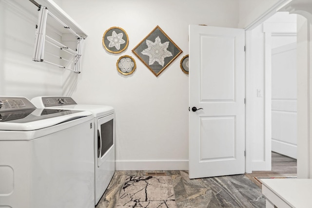154 W Swift Creek Way, Kalispell, MT 59901 - laundry room with independent washer and dryer and baseboards