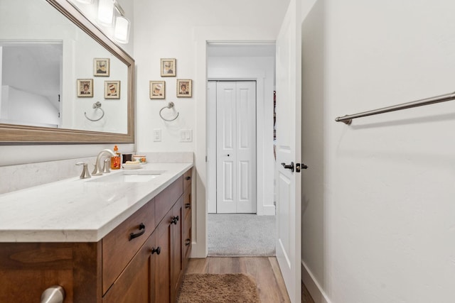 154 W Swift Creek Way, Kalispell, MT 59901 - bathroom with vanity and wood finished floors
