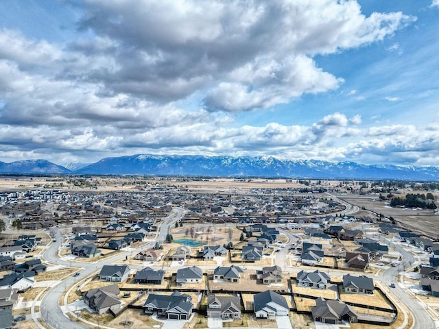 154 W Swift Creek Way, Kalispell, MT 59901 - aerial view of residential area with a mountain backdrop