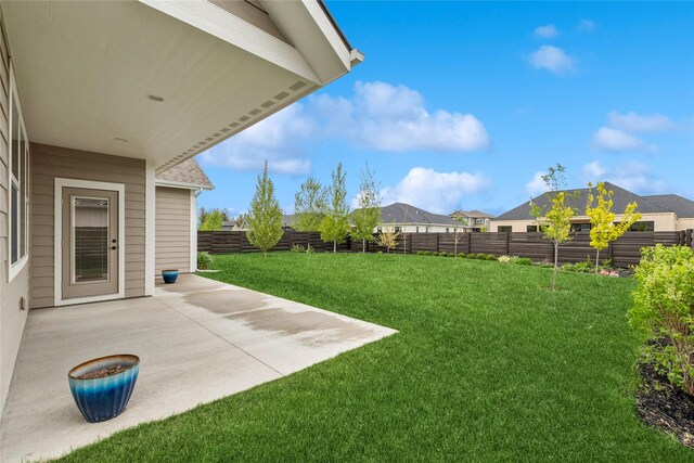 154 W Swift Creek Way, Kalispell, MT 59901 - fenced backyard featuring a patio