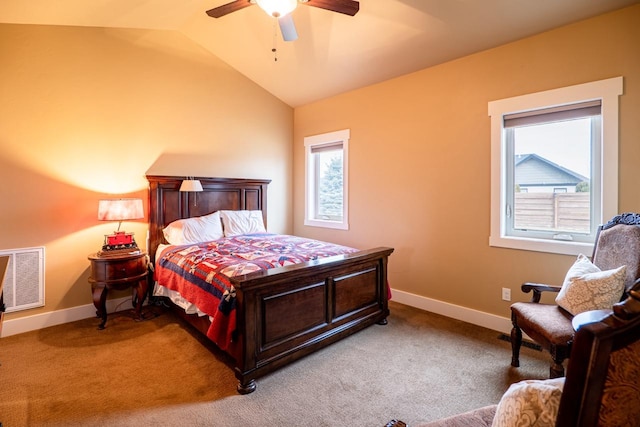 bedroom featuring a ceiling fan, baseboards, vaulted ceiling, and carpet flooring