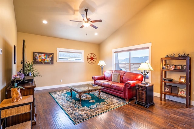 living area with dark wood-style flooring, lofted ceiling, recessed lighting, a ceiling fan, and baseboards