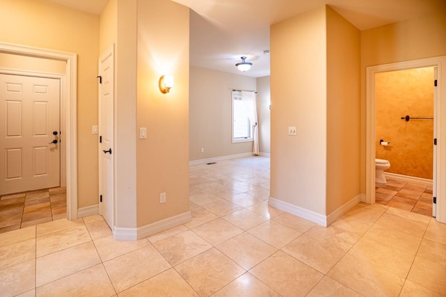 159 Fairway Blvd, Kalispell, MT 59901 - hallway featuring light tile patterned floors and baseboards