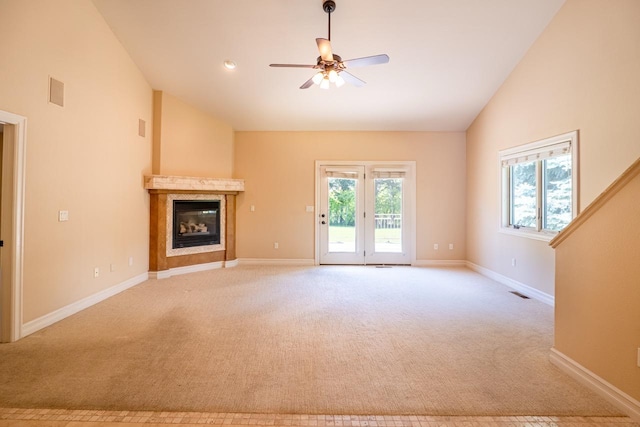 159 Fairway Blvd, Kalispell, MT 59901 - unfurnished living room with light carpet, healthy amount of natural light, lofted ceiling, and ceiling fan